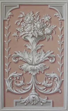 an intricately designed wall panel with flowers on it