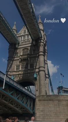 the tower bridge is very tall and has a heart on it