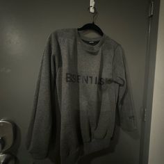 Brand; Essentials Color: Dark Grey Size: S/M Condition; Brand New Christian Grey Sweater, Essentials Sweatshirt, Women Essentials, S Crew, Dark Grey, Scoop Neck, Sweaters For Women, Brand New, Sweatshirts