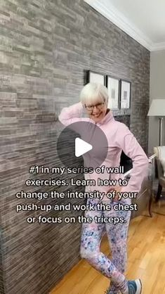 an elderly woman is dancing on the floor in her living room with words written below