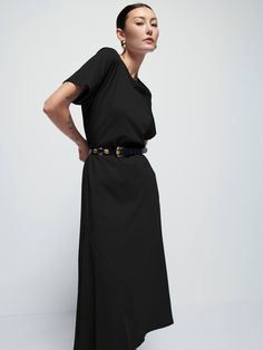 It's your essential t-shirt dress, now with subtle seamed pleats on the front for an effortlessly feminine silhouette. Perfect for moving from off-duty to on-duty with nothing more than a chic belt around the waist. (This one comes in Jet Black.) | Eileen Dress in Jet Black | Ethical Essentials Chic Belt, Feminine Silhouette, Nothing More, Off Duty, Jet Black, How To Look Pretty, T Shirt Dress, Dresses For Sale, Organic Cotton