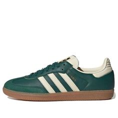 The adidas Samba OG Shoes in vibrant green are a must-have for trendsetters. Originally designed for indoor football, these kicks have transcended their sporty origins. Crafted with a premium leather upper and nubuck overlays, they boast an iconic silhouette perfect for stepping out in style. Gold accents and signature 3-Stripes down the side pay homage to adidas heritage. Whether you’re hitting the streets or making a statement, the Samba OG Shoes combine comfort and flair. Samba Og Shoes, Green Adidas, Adidas Classic, Adidas Samba Og, Limited Edition Sneakers, Football Shoes, Green Cream, Adidas Samba, Sport Sneakers