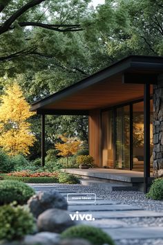 an image of a modern house in the middle of trees and rocks with text overlay that reads vivo