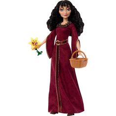 a doll is holding a basket with flowers in it and wearing a long red dress