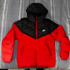 Jacket Is Brand New With Tags, Feel Free To Message Me With Any Questions Or Concerns!! Sports Windproof Nylon Puffer Jacket, Sports Nylon Puffer Jacket With Pockets, Sporty Down Puffer Jacket For Streetwear, Sporty Puffer Windbreaker For Cold Weather, Sporty Windproof Puffer Jacket, Sporty Down Outerwear With Fleece Lining, Sporty Puffer Windbreaker For Outdoor, Nike Functional Puffer Jacket For Cold Weather, Nike Nylon Puffer Jacket