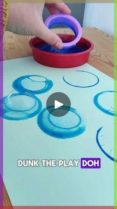 a video demonstrating how to make an art project for kids with the help of dunk the play doh