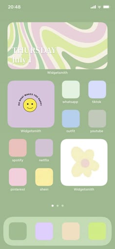 an iphone screen with the text happy friday on it and colorful squares in different colors