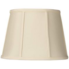 6 1/2" deep x 9" wide at the top x 8" deep x 12" wide at the bottom x 9" on the slant x 9" high. Cream stretch fabric, oval shade shape. White liner, polished brass finish fitter. Design by Springcrest Collection™. Spider fitting; the correct size harp is included free with this shade.  This oval lamp shade offers a clean and classic look for your favorite lamp. It comes in a cream stretch fabric with vertical ribs. Fold-over self trim is on both the vertical ribs and the top and bottom trim. Inside is a white fabric liner and a polished brass finish spider fitter.  Shop all Springcrest Oval Lamp, Square Shades, Globe Lamps, White Liners, Porcelain Lamp, Small Table Lamp, Royal Design, Drum Lampshade, White Table Lamp