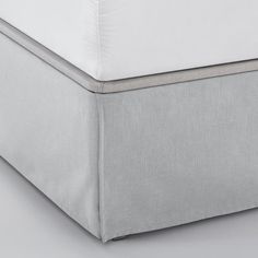 an image of a mattress with no sheets on it