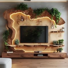 a living room with a large tv on the wall and some plants growing out of it