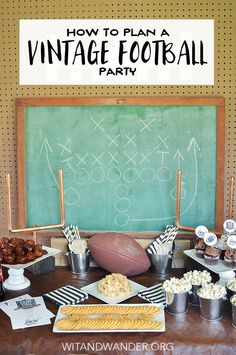 a football themed party with snacks and desserts on the table in front of a chalkboard