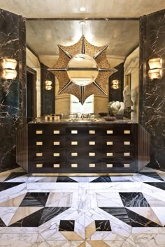 an elegant bathroom with black and white marble flooring, gold star decoration on the wall