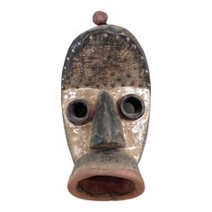 Stunning piece of Dan Bugle tribe African Art.This is a bold and powerful looking carved wooden mask from the Dan peoples of the Ivory Coast of west Africa. This mask is known as a Bugle mask and the appearance of this mask during pre-war ceremonies was used to make trouble and provoke reactions from the people watching the ceremonies.  Condition  Good condition. This piece came from the Ivory Coast and is most likely from the Dan Tribe,circa 1980 or older  The Dan Tribe and sub Tribes Guere and Traditional Masks Culture, Benin Mask, Tribe Mask, Ceramic African Masks, African Tribe Mask, Wooden Mask, People Watching, Liberia, African Masks