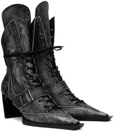 Handcrafted ankle-high buffed leather boots in black featuring distressing and fading throughout. These lace-up boots feature a pointed square toe, pin-buckle strap at the vamp, and extended tongue. Zip closure at the inner side. Logo embossed at the molded leather footbed. Grained leather lining. Curved heel with rubber injection. Leather sole. Heel: H2.75 in. Armor Boots, Pixie Boots, Boots With Laces, 20th Bday, Witch Boots, Pointed Boots, Pointed Toe Boots, Lace Up Heels, Black Leather Boots