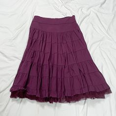 Vintage 2000s low rise skirt in purple. In good vintage condition. Note: I try to match colors as much as possible to pictures but there is a possibility it won't be an exact match. Unless the color is completely incorrect I am unable to offer refunds for this reason. Size: labeled "t5" fits like a large/extra large Brand is attentif Measurements (taken on garment laid flat): Waist: 35" Hips: 58" Length: 33.5" Fabric: not labeled Purple Stretch Tiered Skirt, Purple Cotton Tiered Skirt, 2000s Low Rise, Fall Shopping List, Skirt Grunge, Midi Skirt Vintage, Low Waist Skirt, Low Rise Skirt, Match Colors