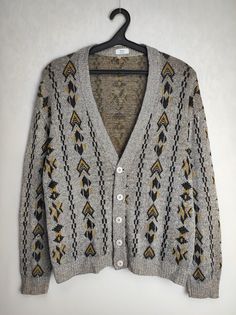 Vintage men's linen blend cardigan Good used condition Size tagged 52, fits like L (please check measurements) Composition: 37% linen, 22% acrylic, 15% modal, 15% viscose, 15% cotton Measurements: Shoulder to shoulder - 22.4″ / 57 cm Pit to pit - 24.4″ / 62 cm Back length from collar - 23.6″ / 60 cm Sleeve length from shoulder - 22.8″ / 58 cm *All measurements are taken with the garment laying flat #4348 Great Coat, Retro Sweater, Mens Linen, Jumpers And Cardigans, Shoulder To Shoulder, Linen Blend, Sweater Outfits, Vintage Men, Sweaters & Cardigans