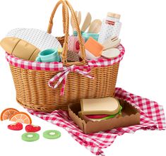 a picnic basket filled with food and condiments