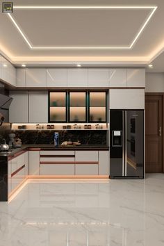 a modern kitchen with marble counter tops and black appliances, along with white walls and flooring