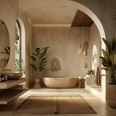 a bath room with a large tub next to two sinks and potted plants on the wall