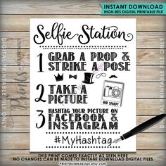 the selfie station sign is shown in black and white, with an instagram sticker