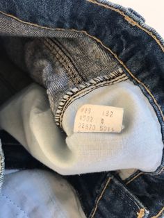 "Waist:26\" Rise:10.5\" Hips:32\" Inseam:6\" These are USA made Movin' On Levis zip fly cutoffs circa the late 70's or early 80's. They're tagged a vintage 28\" but fit a modern 26\" at largest. Please follow the measurements provided above and in the photos for an accurate fit as true vintage runs small and narrow. They're cut to the perfect unisex length and have amazing details on the pockets and feature a rare blue tab. 🍑(5)" Vintage Straight Leg Cotton Shorts, Vintage Cotton Straight Leg Shorts, Retro Cotton Jean Shorts With Frayed Hem, Retro Straight Leg Jean Shorts With Pockets, Vintage Dark Wash Mid-rise Shorts, Vintage Style Mid-rise Dark Wash Shorts, Vintage Cutoff Jean Shorts In Medium Wash, Vintage Medium Wash Cutoff Jean Shorts, Vintage Medium Wash Jean Shorts With Frayed Hem