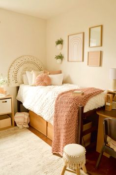 a bedroom with a bed, desk and chair in it's centerpieces