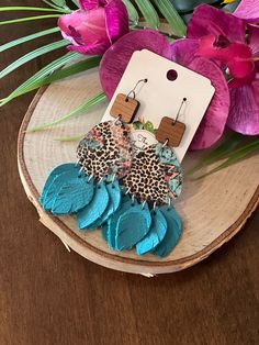 Gorgeous turquoise cheetah feathers geometric dangle leather earrings! These earrings add a pretty pop of turquoise to your outfits! They are made from high quality genuine leather and square maple wood connector pieces. The earring hooks are surgical stainless steel. Geometric Feather, Wood Connectors, Jewelry Birthday, Birthday Gift For Her, Earrings Statement, Earring Hooks, Maple Wood, Leather Earrings, Birthday Gifts For Her