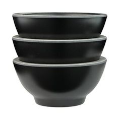 three black bowls stacked on top of each other