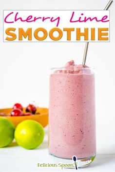 cherry lime smoothie in a glass with a straw