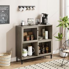 a shelf with coffee mugs and other items on it