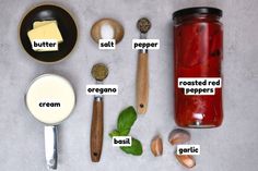 ingredients to make an italian salad laid out on a table with spoons and measuring cups