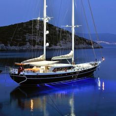 a large boat floating on top of a body of water