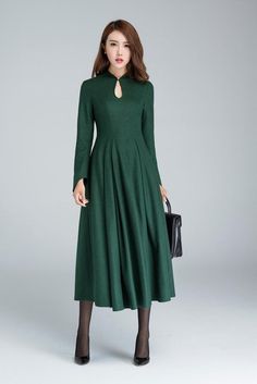 Vintage style swing dress in green Wool dress women Vintage | Etsy Green A-line Maxi Dress For Fall, Green Maxi Evening Dress For Winter, Green Formal Winter Dress, Green Formal Dress For Winter, Wool Evening Dress For Winter, Formal Green Maxi Dress For Fall, Green Winter Workwear Dress, Green A-line Winter Dress, Green Midi Dress For Winter