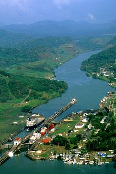 an aerial view of a harbor and town