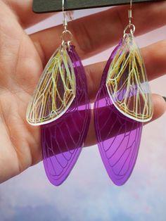 🧚Meet your new favorite earrings! The delicate design makes a unique gift for a friend or yourself. These earrings are super lightweight as well. 🧚The larger wing is 2.5 inches long and .8 inches wide. The smaller wing is 1.4 inches long and .8 inches wide. They are made of lightweight 1/8th inch thick laser cut acrylic. They are attached to sterling silver ear wires that come with a plastic ear nut back. 🧚 Take care: acrylic can be prone to scratching so do your best to treat these earrings like wearable art 🧚 Check out my other listings for different color options like neon green/pink that glows under a black light 🧚If you would like a different size or color feel free to send me a message! I love making custom jewelry 🧚 Follow me on instagram @queen.beams for special promos and a Laser Cut Jewelry Acrylic, Laser Engraved Earrings, Bug Jewelry, Laser Cut Earrings Acrylics, Laser Engraved Acrylic, Homemade Earrings, Engraved Acrylic, Laser Cut Jewelry, Laser Cut Earrings