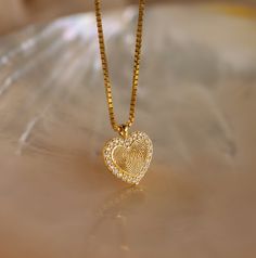 P A V E ∙ F I N G E R P R I N T ∙ H E A R T ∙  N E C K L A C E Meet our Pave Fingerprint Heart Necklace--a heartfelt blend of personalization and elegance. Each custom heart-shaped pendant features an engraved fingerprint of your choice and is embellished with diamonds around the perimeter, encircling the heart for extra sparkle. Whether it's a cherished memory or a symbol of affection, this necklace adds a touch of sentimentality to any look ♡  * Material: High Quality Solid 925 Sterling Silver Heart Fingerprint, Fingerprint Heart, Fingerprint Necklace, Traditional Ink, Solid Gold Necklace, Engraved Jewelry, R P, Rose Gold Necklace, Heart Jewelry