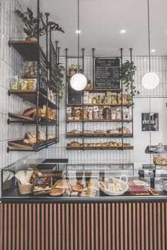 a bakery filled with lots of bread and pastries