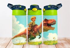 two children's water bottles, one with a dinosaur and the other with a boy on it