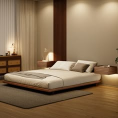 a bed sitting on top of a wooden floor next to a lamp and dressers