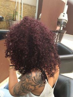 Deep Red Curly Hair Natural Curls, Plum Red Hair Color Burgundy, Curly Hair Dark Purple, Purple Red Hair Curly, Dark Purple Curly Hair Black Women, Dark Red Hair Curly Natural, Black Red Hair Curly, Black Cherry Hair Curly, Red Purple Curly Hair