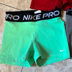 Size Medium Brand New Condition $15 Retail $24 Nike Green Athletic Shorts With Built-in Shorts, Nike Green Athletic Shorts, Nike Green Sporty Athletic Shorts, Green Nike Athletic Stretch Shorts, Nike Green Training Shorts, Nike Green Stretch Athletic Shorts, Nike Sporty Green Shorts, Sporty Green Nike Shorts, Nike Green Athletic Shorts With Built-in Liner