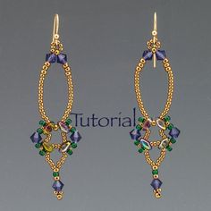 a pair of earrings with green and blue beads