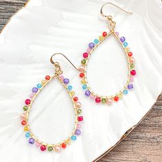 Colorful and light, everyday style hoops. 2” Trendy Dangle Hoop Earrings For Spring, Trendy Spring Dangle Hoop Earrings, Spring Trendy Dangle Hoop Earrings, Handmade Casual Hoop Jewelry, Spring Hoop Earrings For Everyday, Trendy Teardrop Earrings For Spring, Spring Trendy Teardrop Earrings, Summer Multicolor Nickel-free Hoop Earrings, Colorful Hoop Earrings For Summer