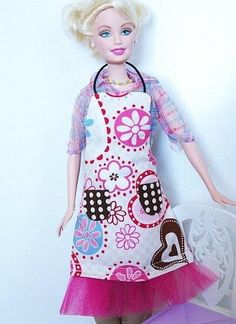 a barbie doll is standing next to a chair with an umbrella on it's side