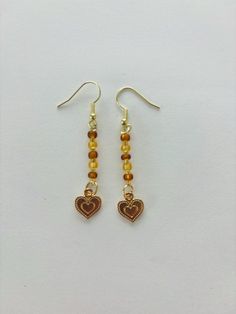 These Autumn themed dangle earrings are perfect for a boho/hippie vibe and cozy vibes!! The perfect match for your warm and cozy daily outfits during fall! They are made out of metal and don't have a closing to put on the ear wires. Hippie Vibes, Cozy Vibes, Dangly Earrings, Boho Hippie, Jewelry Store, Ear Wires, Daily Outfits, Perfect Match, Jewelry Stores