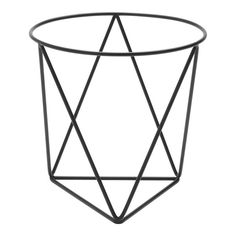 a black metal wire and glass side table with geometric shapes on the top, against a white background