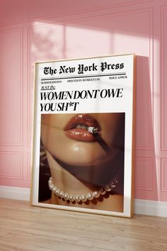 an advertisement for the new york times featuring a woman's lips and pearl necklace