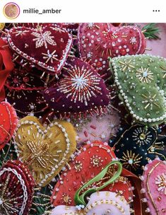 several heart shaped ornaments are arranged on a table