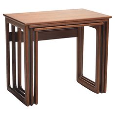 three nesting tables with one end on each side and the other at the top, all in dark wood