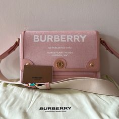 Really Adorable (And Sturdy!) Burberry Horseferry Note Crossbody In Pink With Gold Hardware. Nwt. Retails For $1,450. I Purchase All Of My Items From The Brand Store/Website Or From Major Department Stores. Please Ask Questions Prior To Purchase. 25 X 8.5 X 18cm/9.8 X 3.3 X 7.1in Min. Shoulder Strap Drop: 38cm/15in Max. Shoulder Strap Drop: 59cm/23.2in Outer: 100% Cotton Trims: 100% Leather; 78% Polyester, 22% Polyamide Lining: 55% Cotton, 45% Linen Detachable, Adjustable Crossbody Strap One Ext Pink Burberry Bag, Luxury Pink Crossbody Satchel, Burberry Peyton Crossbody Bag, Burberry Crossbody Bag, Designer Purses And Handbags, Burberry Purse, Burberry Horseferry Bag, Burberry Wallet, Luxury Pink Shoulder Bag With Gold-tone Hardware